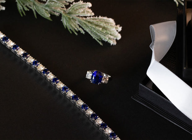 Three Stone Cushion Cut Blue Sapphire and Diamond Ring | Platinum