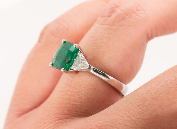 Three Stone Cushion Cut Emerald and Trillion Diamond Ring | Platinum