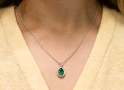 Pear Shape Emerald with A Halo of Diamonds Pendant Necklace