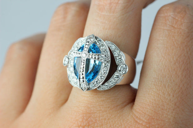 Blue Topaz And Diamond Cross Ring