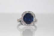 Round Sapphire Halo Diamond Ring