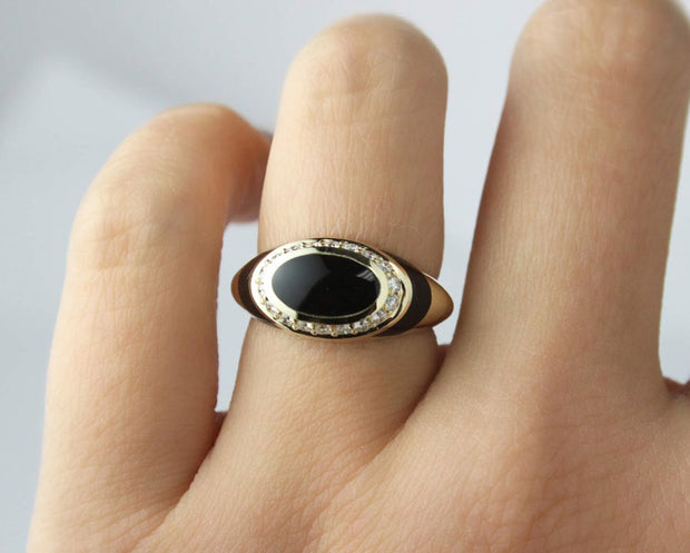 Oval Onyx and Diamond Fashion Ring