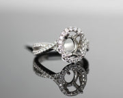 Oval Halo with Intertwined Shank Setting