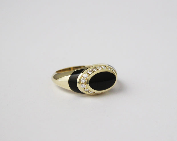 Oval Onyx and Diamond Fashion Ring